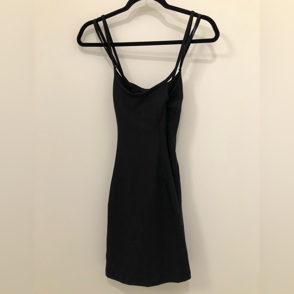 Athletic cross back dress with shorts underneath. Never worn with tags!